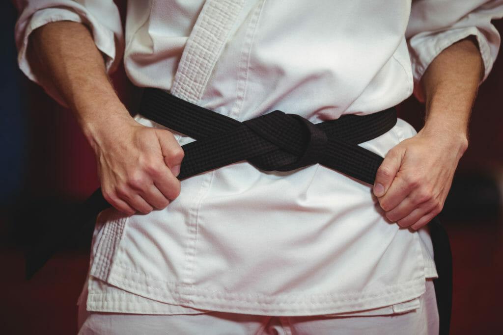 Karate player in black belt